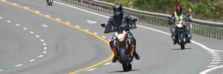 Motoryclists on road