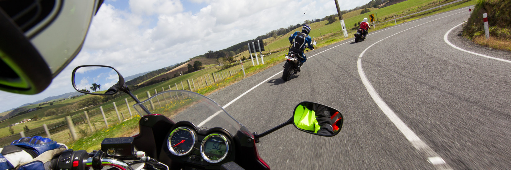 Motorcyclist point of view, riding around corner