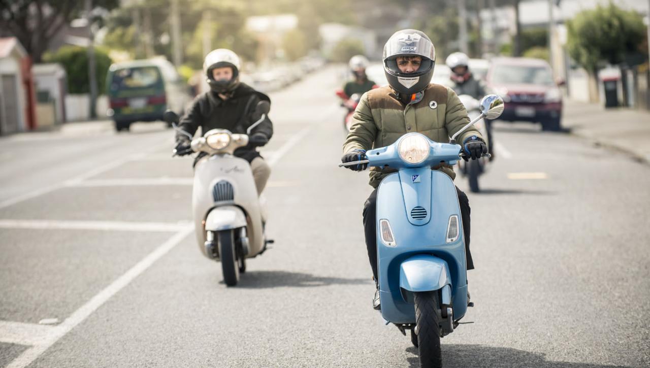 Group of riders on scooters