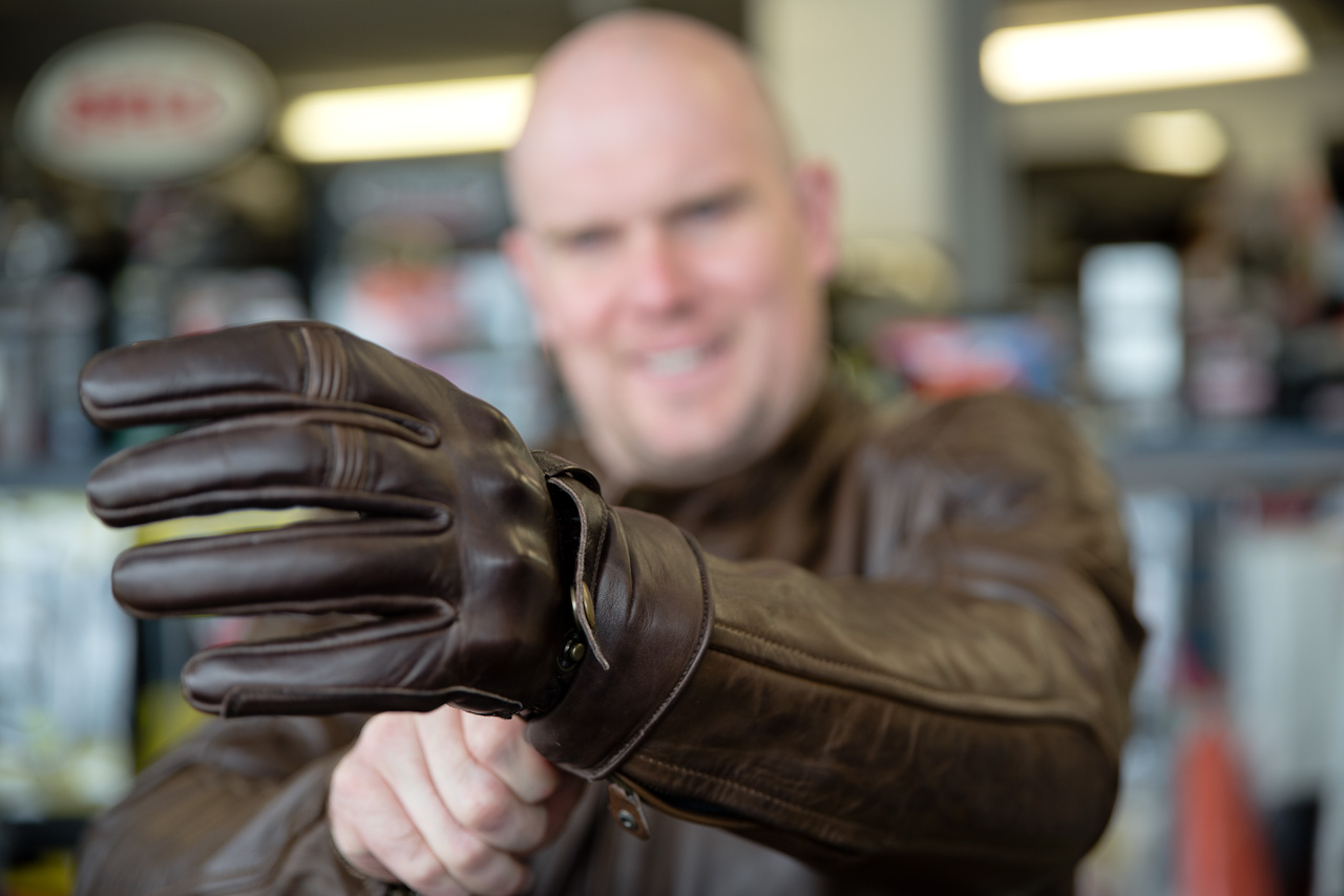 Trying on leather gloves