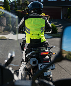 View of braking motorcycle from behind