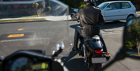 View of braking motorcycle from behind
