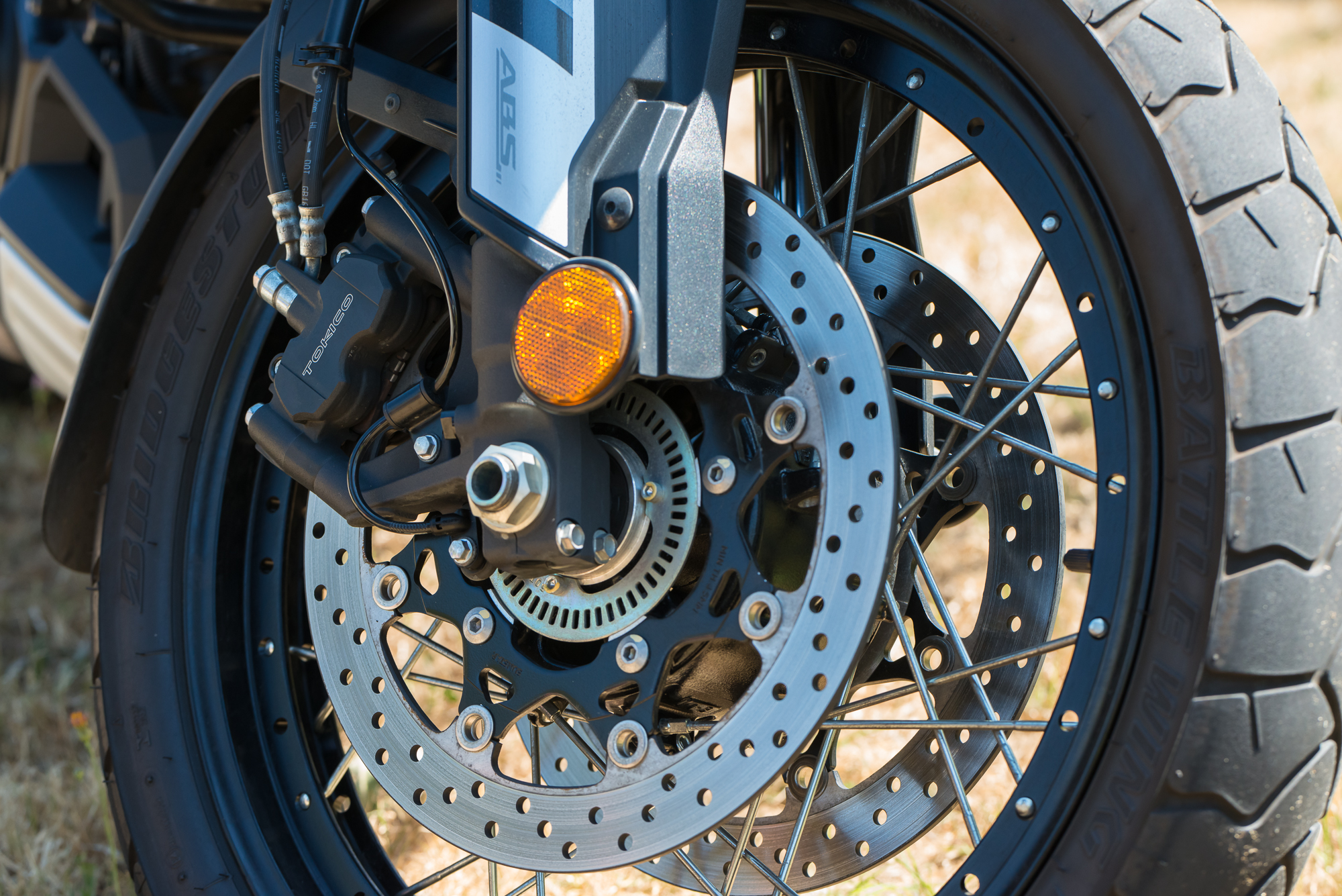 Close up of dual purpose/adventure bike wheel